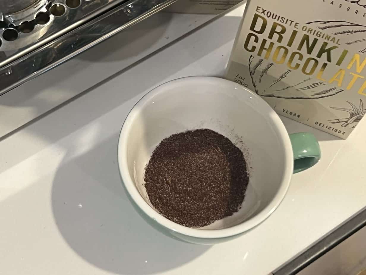 Step 1 put a tea spoon of chocolate in cup Step 1 put a tea spoon of chocolate in cup