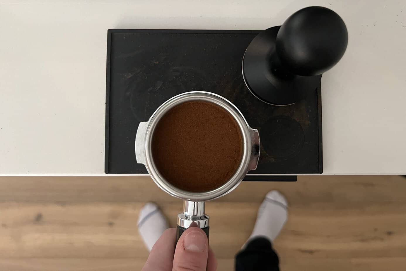 Tamping pressure to form coffee puck